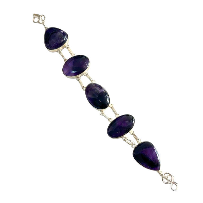 Amethyst Metal Bracelet Amethyst Metal Bracelet with natural amethyst stones and silver metal design for spiritual balance, stress relief, and chakra healing.