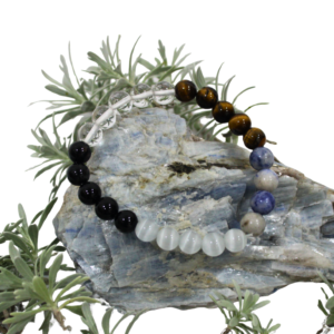 Focus and concentration crystal bracelet with Clear Quartz, Black Obsidian, Selenite, Tiger Eye, and Sodalite beads.