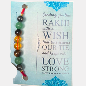 Handcrafted Money Attraction Rakhi featuring Green Aventurine, Natural Citrine, Tiger Eye, and Hematite crystals to symbolize prosperity, abundance, confidence, grounding, and positive energy.