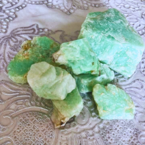 Natural Raw Amazonite crystal with an unpolished finish, valued for calmness, emotional balance, confidence, clear communication, and inner peace.