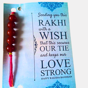 Handcrafted Red Carnelian Rakhi featuring a natural Red Carnelian gemstone, symbolizing confidence, courage, creativity, motivation, and positive energy.